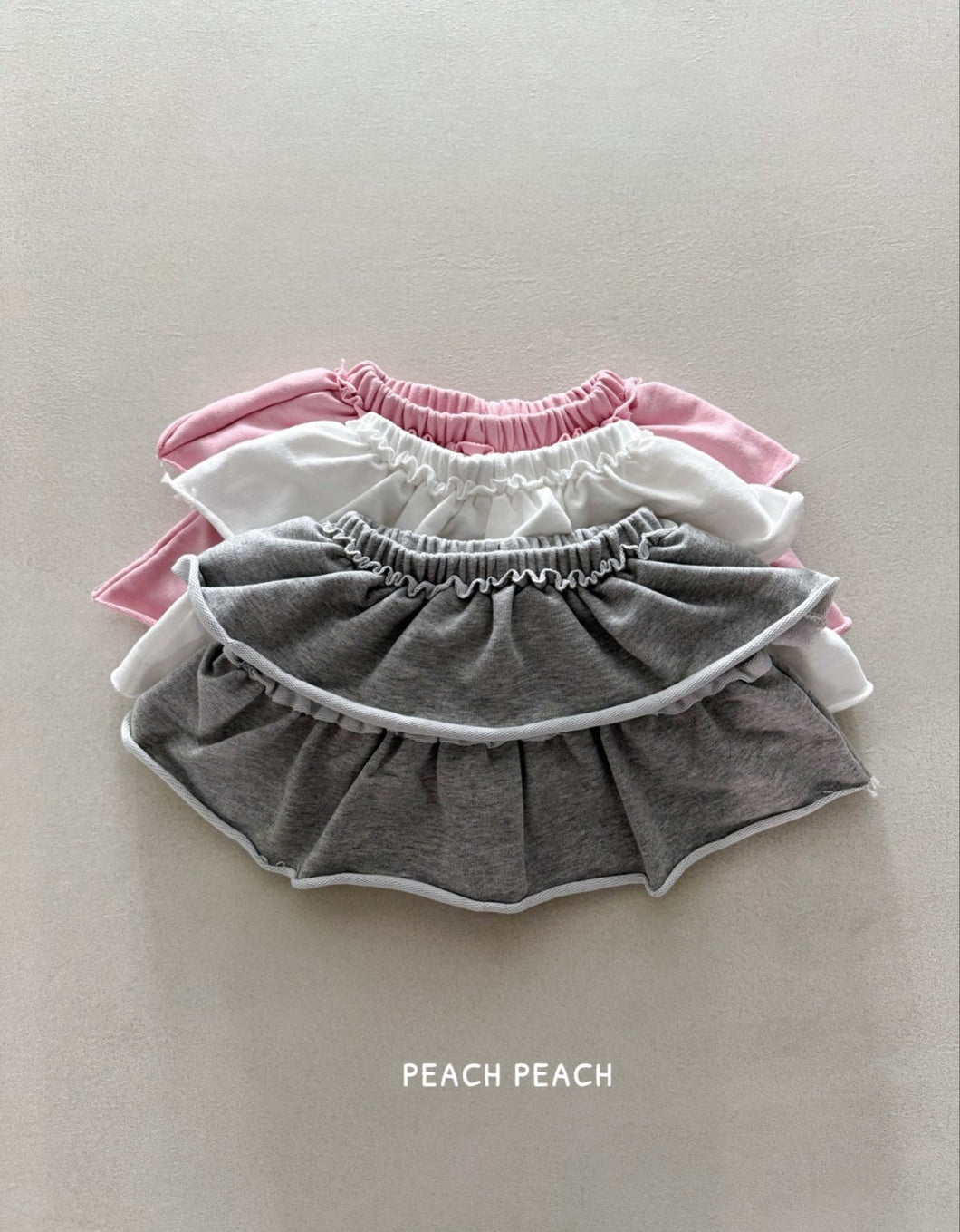 【予約】 ココスカートパンツ　bottom　2025　Kids　ジュニアサイズ　peach peach